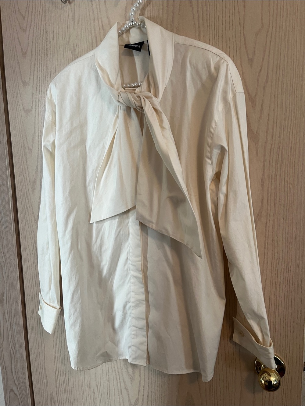 Tie-Neck Ivory Blouse with Feminine Bow